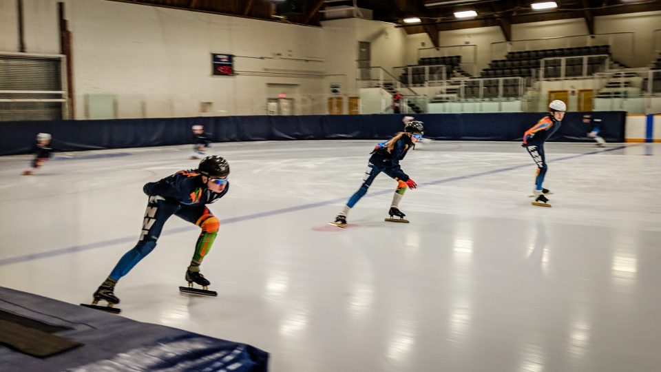 Team NT speed skaters warm up at the 2018 Arctic Winter Games
