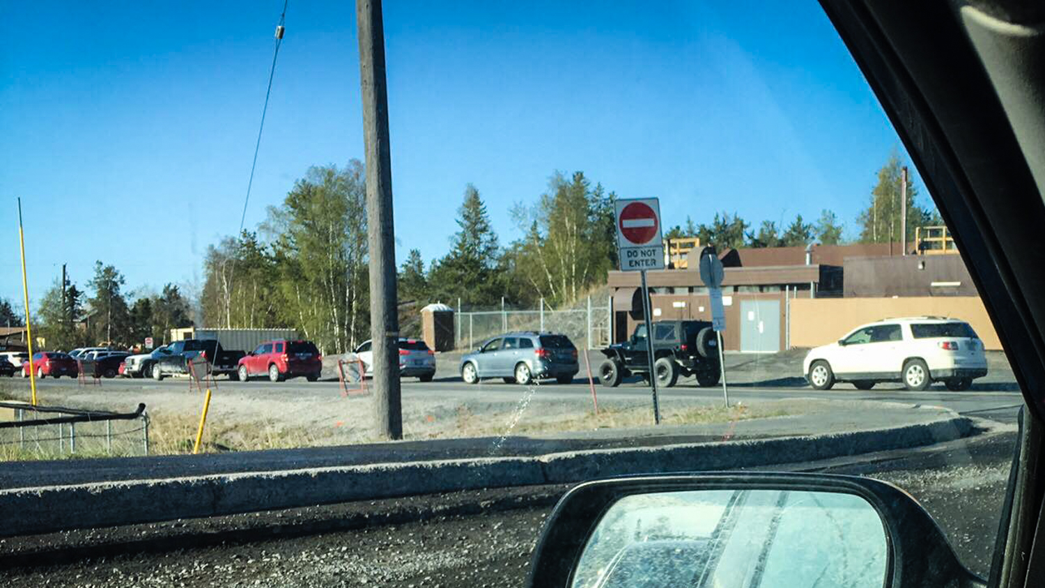 Traffic backs up along Yellowknife's Reservoir Road during a road closure in May 2018