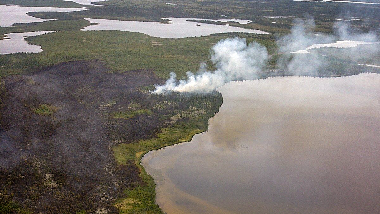 A wildfire burns in the region of Wekweètı̀ in a photo released by the Department of Environment and Natural Resources on July 13, 2018