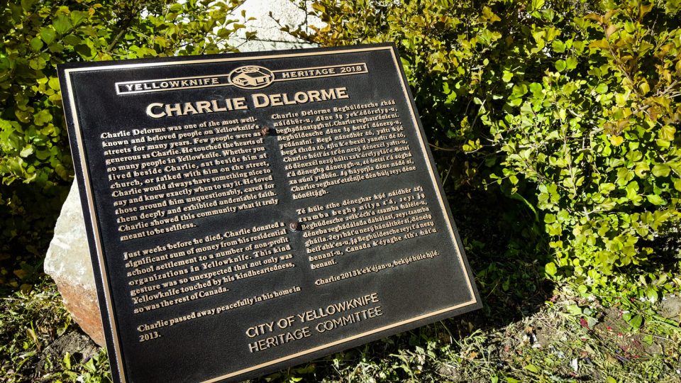 A plaque dedicated to Charlie Delorme on Yellowknife's 48 Street