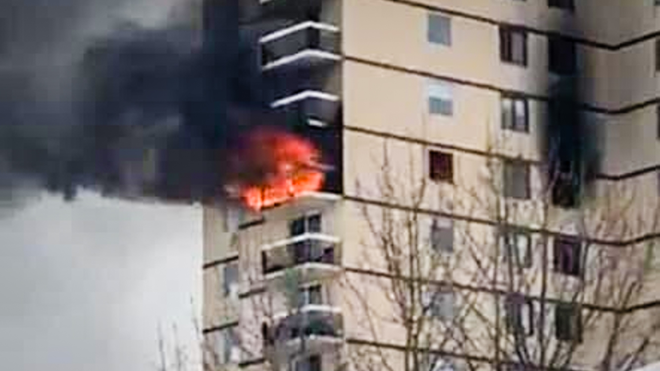 A fire burns inside Hay River's highrise on the afternoon of March 15, 2019