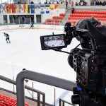 A television camera broadcasts a hockey game involving Team NT at the 2019 Canada Winter Games