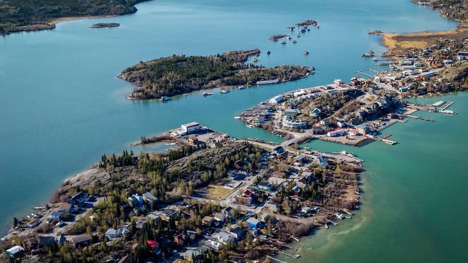 Houseboats sit off Joliffe Island in Yellowknife Bay in May 2018