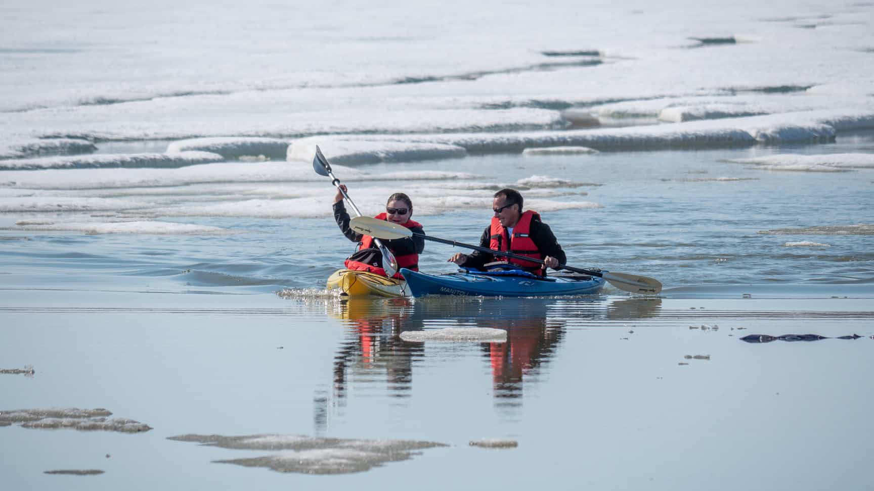 Kayakers head out for a paddle during Sachs Harbour's Oceans Day in July 2019. Inuvialuit Regional Corporation photo