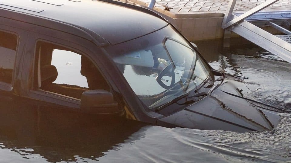 The front of a partly submerged vehicle