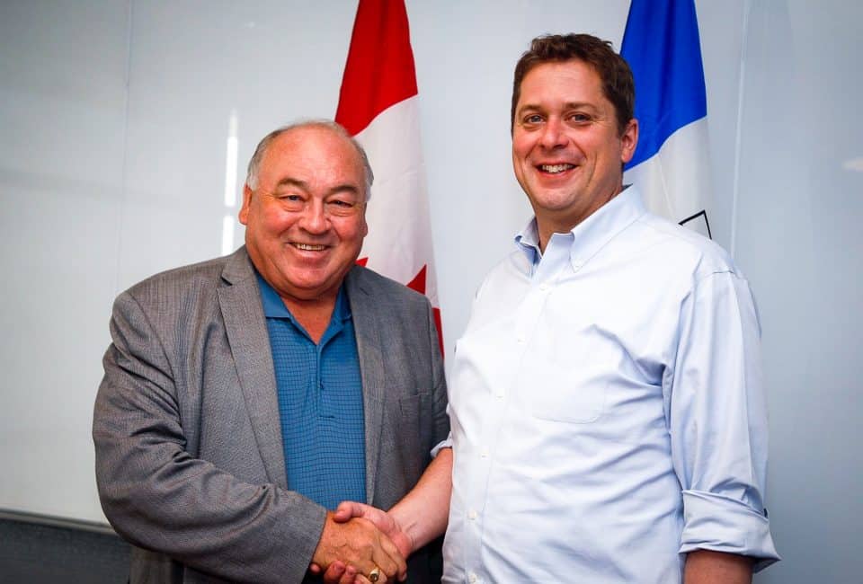 NWT Premier Bob McLeod, left, appears alongside federal Conservative leader Andrew Scheer in a photo posted online by Scheer in July 2019