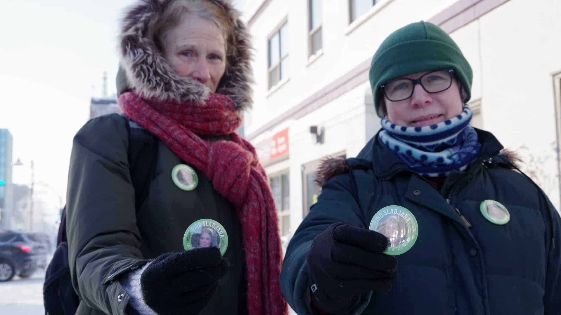Nancy Vail, left, and Val Braden remind residents of the missing Sladjana Petrovic. Emelie Peacock/Cabin Radio