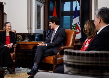 NWT Premier Caroline Cochrane, left, meets with Prime Minister Justin Trudeau in December 2019
