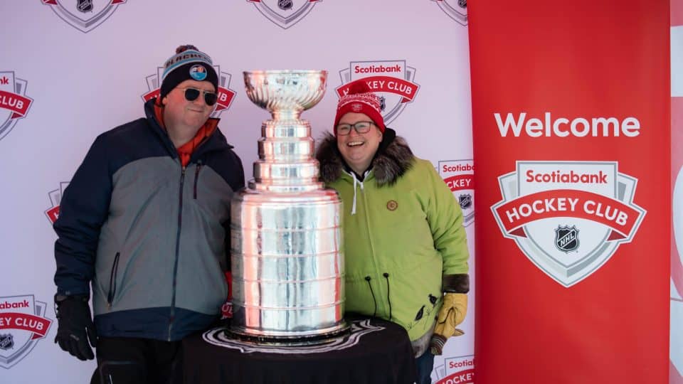 Jeremy Walsh and ??? pose with the Stanley Cup at Hockey Day in Canada. Sarah Pruys/Cabin Radio