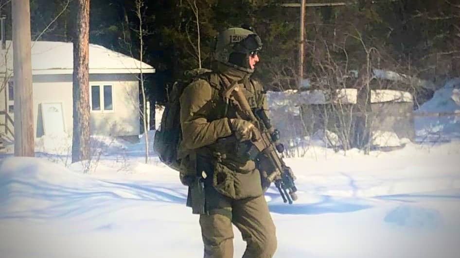 An RCMP officer in tactical apparel responds to an incident in Fort Smith