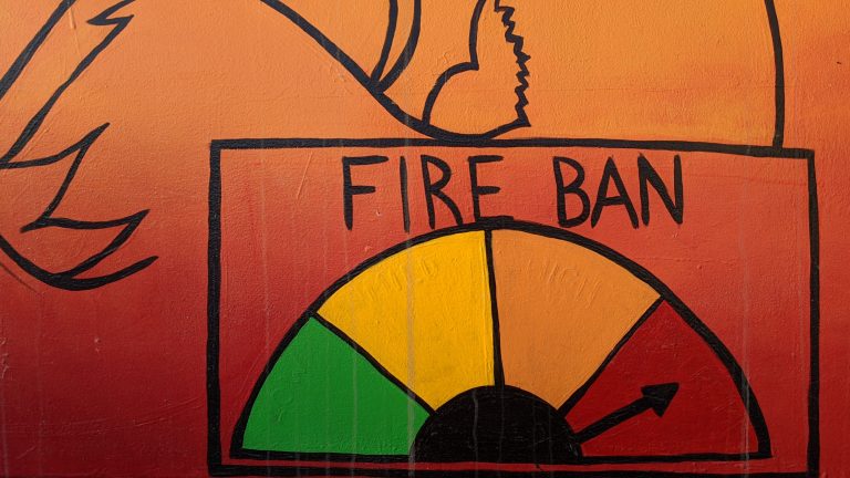 A file photo of transformer box art illustrating extreme fire danger. Sarah Pruys/Cabin Radio