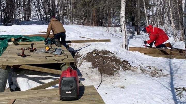 Rotarians working on the new bridge in April. Photo: Yellowknife Rotary True North