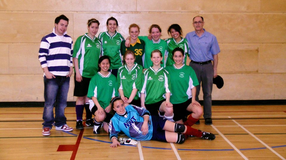 Gerard Landry with a school soccer team in 2008