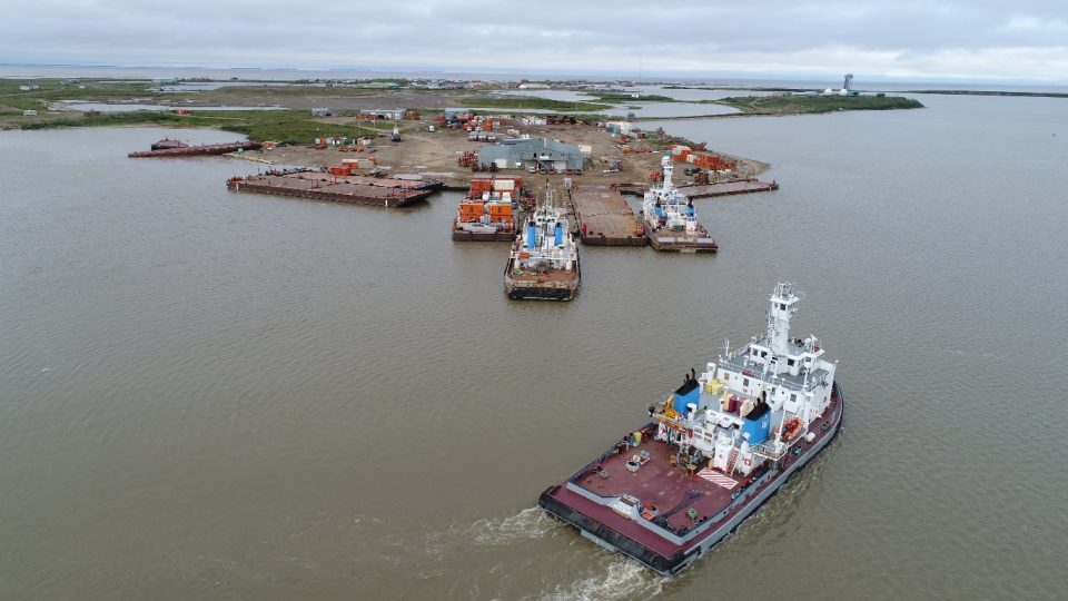 An NWT government photo of barges in Tuktoyaktuk harbour