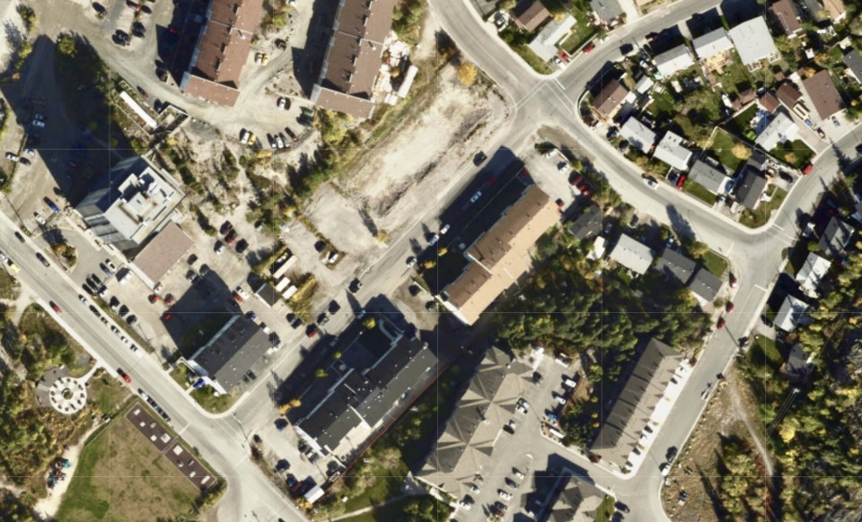 A satellite image shows, top centre, the empty former site of the Rockhill apartment complex