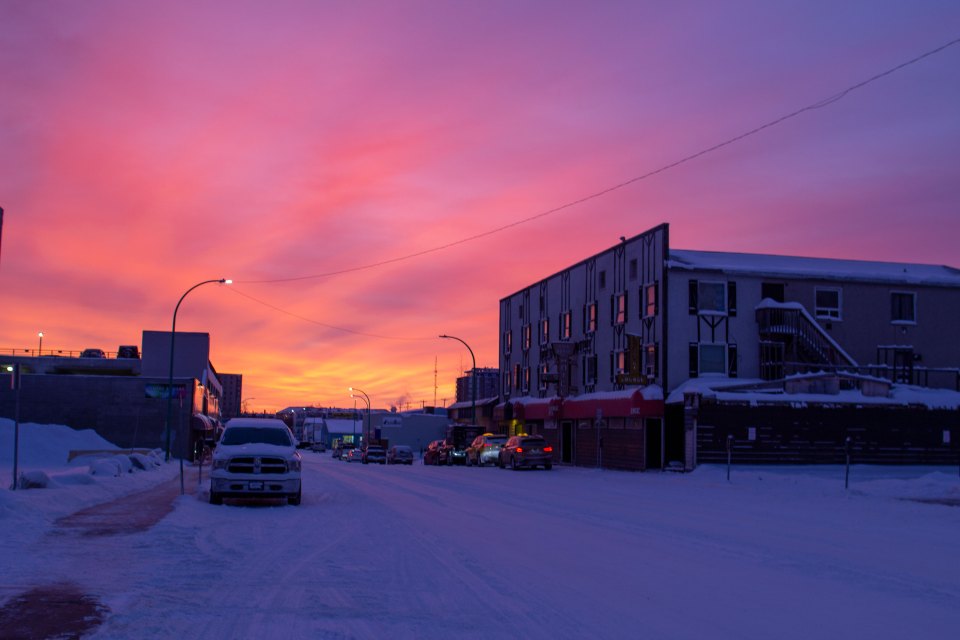 Sunrise over Yellowknife's Gold Range building in December 2020