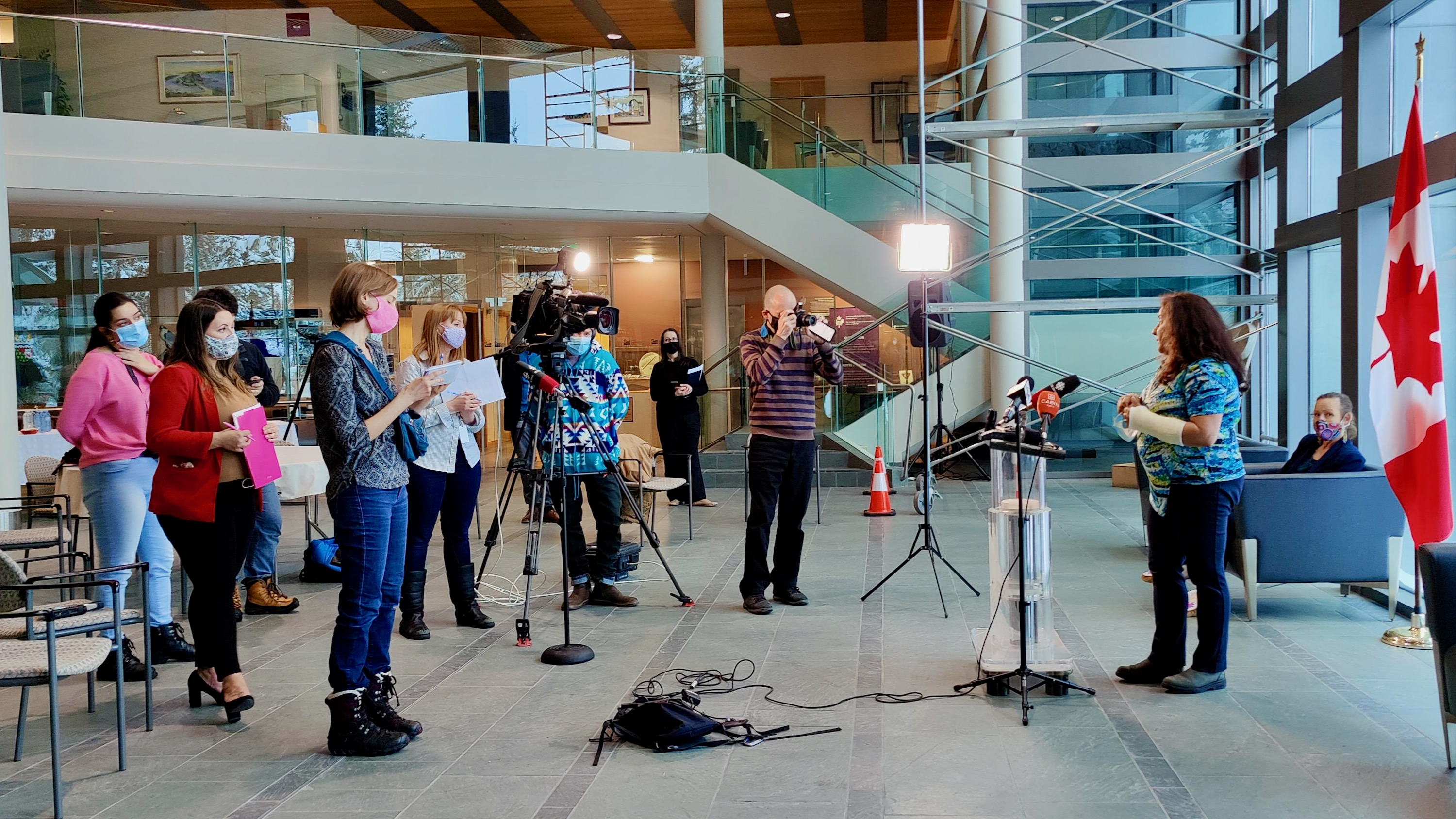 Dr Kami Kandola addresses reporters at the NWT legislature