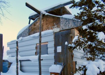 An image provided by the NWT government shows a posting notice attached to a cabin by the Department of Lands