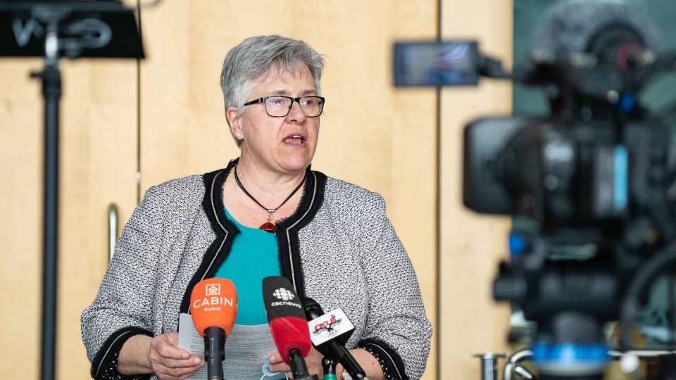 Julie Green, the NWT's health minister, appears at a news conference in 2021