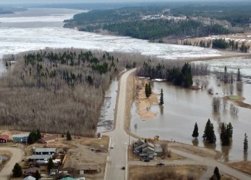 Flooding surrounds the causeway in Fort Simpson on May 9, 2021