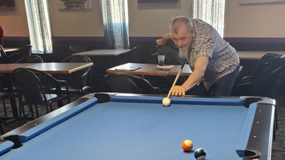 Roman ‘Ron’ Rosnawski playing pool in a submitted photo.