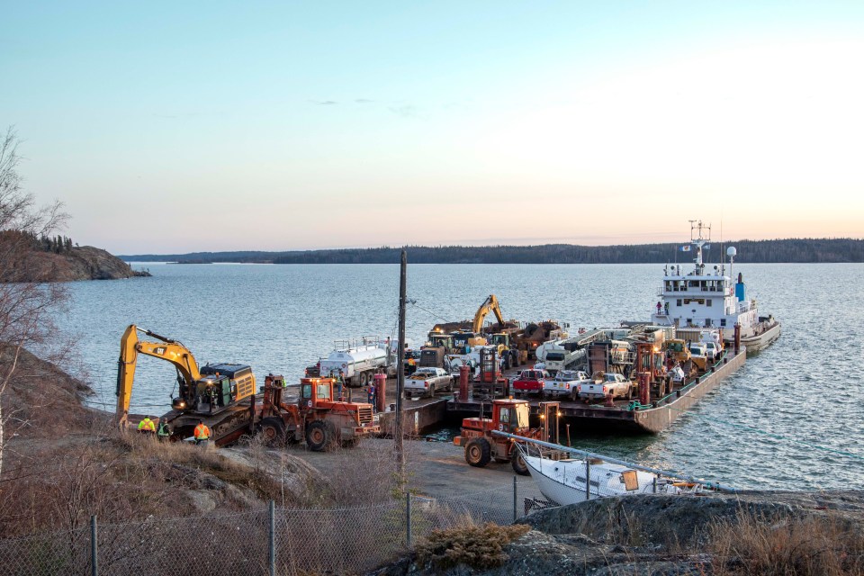 Freight barges dock in Yellowknife on October 14, 2021
