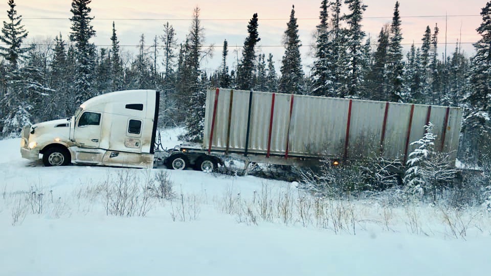 A photo shared online by Yellowknife Scouts shows a truckload of Christmas trees in the ditch off Highway 3