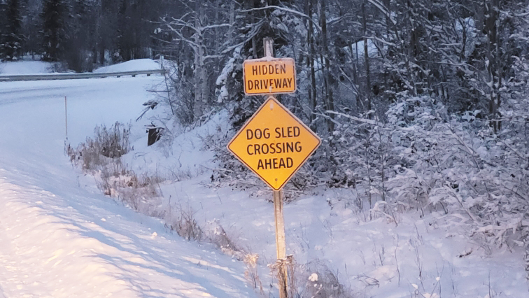 A sign warns of the crossing from Grace Lake to Kam Lake
