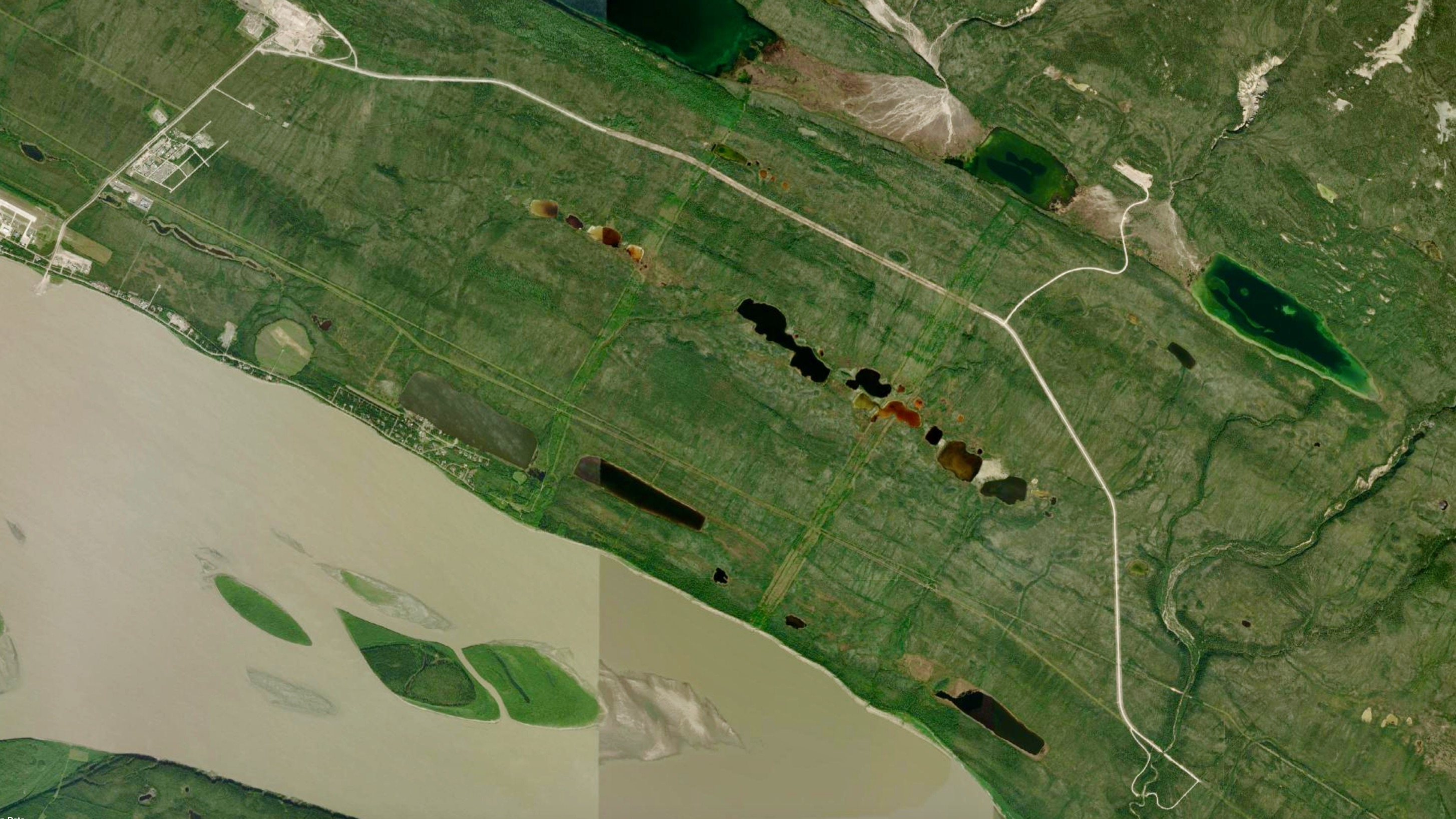 A section of road due to be upgraded in the first phase of the Prohibition Creek project, outside Norman Wells, is seen in a satellite image