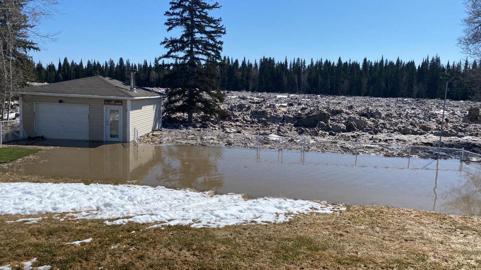 The river gradually encroached upon this shed and yard