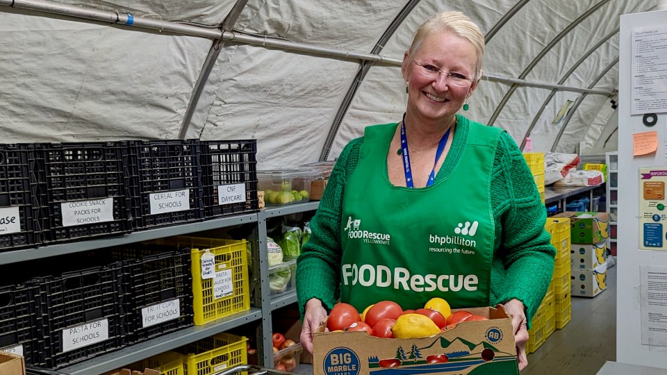 Gerri Whiteford inside Food Rescue's facility