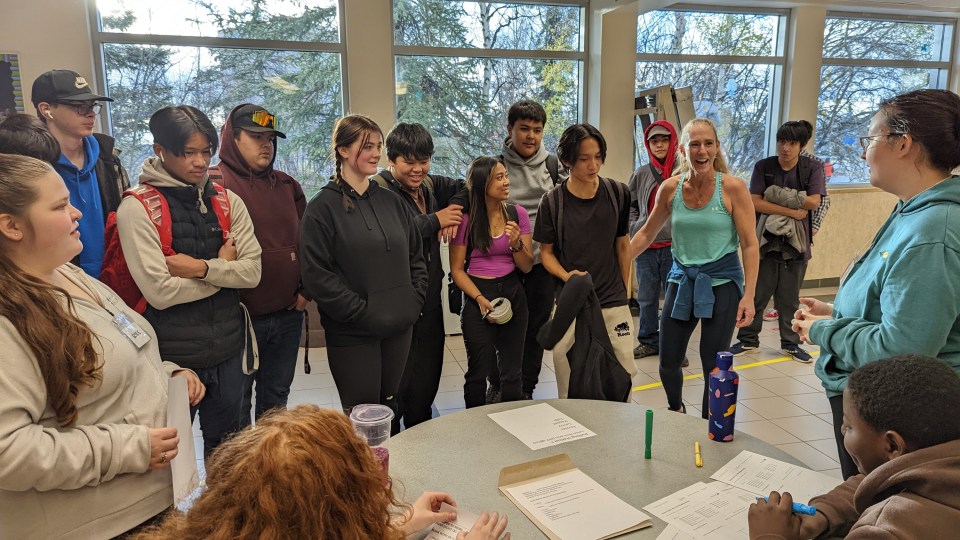 A group of students arrives to vote