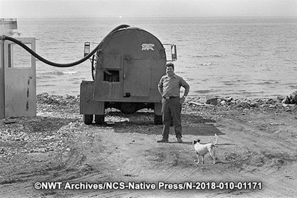 George Lorette stands in front of his water truck in Fort Resolution in May 1973