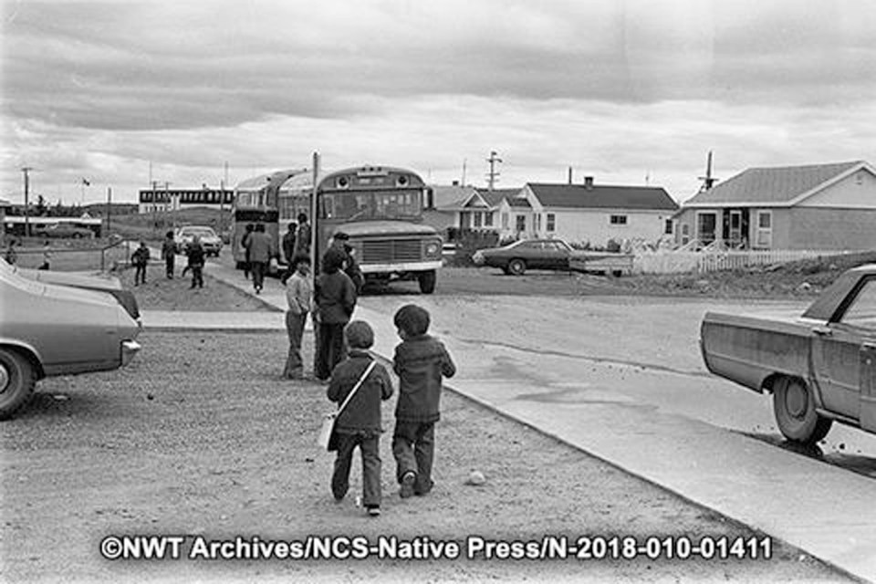Catching the school bus in Yellowknife in October 1973