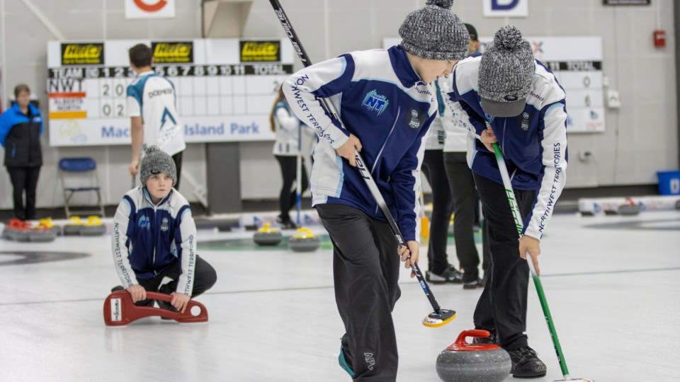 Team NT's male curlers in action on the opening day of Wood Buffalo 2023