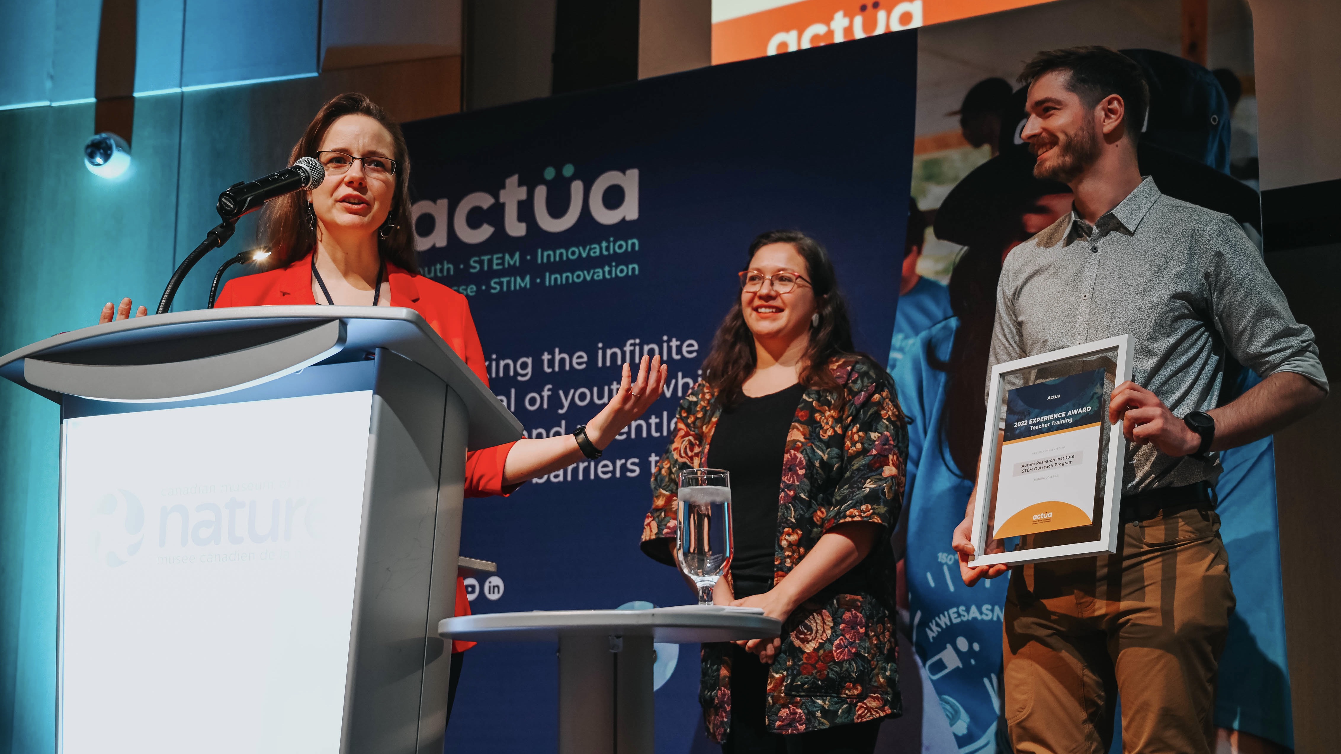 Annika Trimble, Hilary Turko and Chris Black accept the 2022 Actua Experience - Teacher Training Award at a ceremony in Ottawa. Photo: Aurora College.