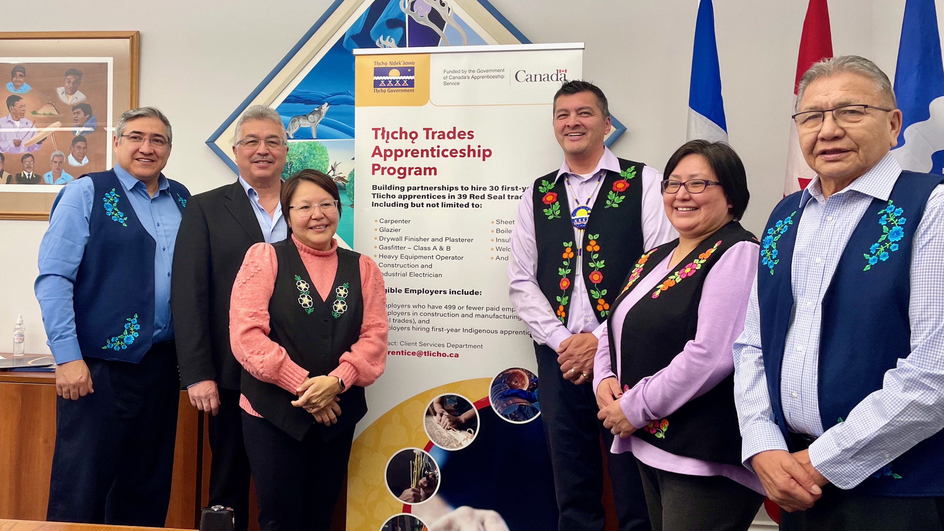 Dignitaries at the announcement of a Tłı̨chǫ apprenticeships program, including NWT MP Michael McLeod, second from left, and Tłı̨chǫ Grand Chief Jackson Lafferty, third from right
