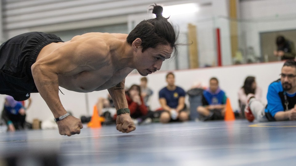 James Williams competes for Team NT in knuckle hop