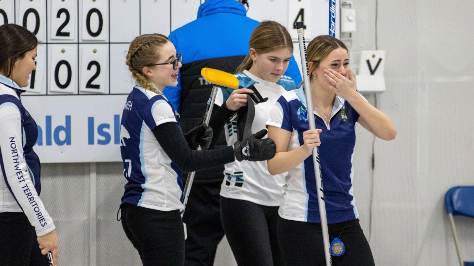 Team NT's curlers celebrate gold at the 2023 Arctic Winter Games. Ollie Williams/Team NT