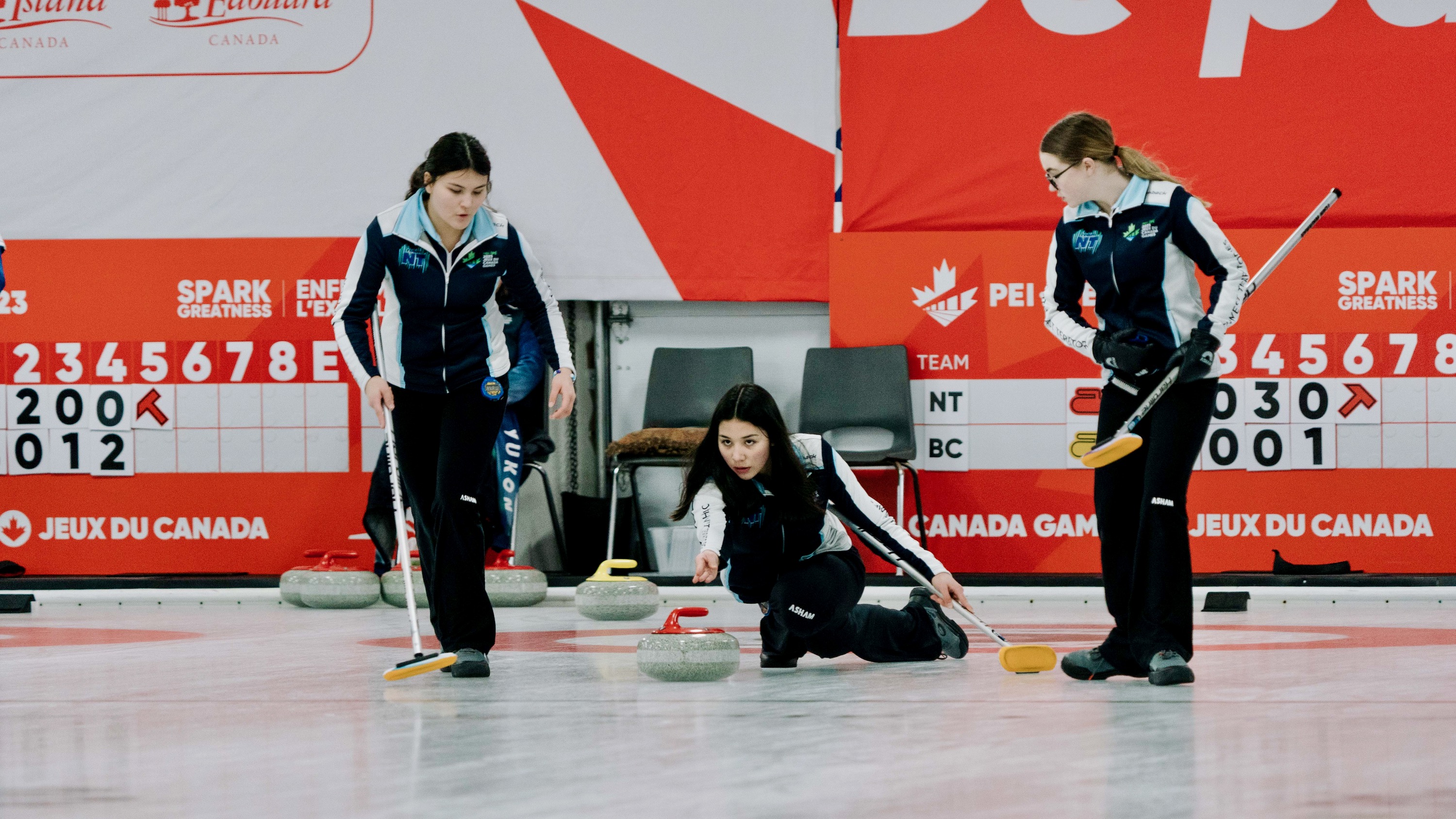 Tamara Bain, left, and Reese Wainman, centre, compete alongside Brooke Smith for Team NT at the 2023 Canada Games