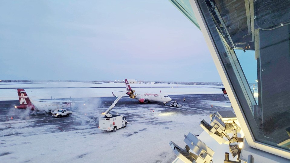 Canadian North's first scheduled direct flight between Yellowknife and Calgary prepares to depart on February 14, 2023
