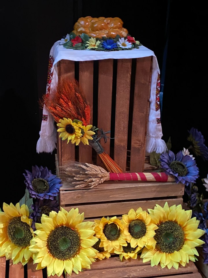 A prop for the recital. A traditional Ukrainian welcome is the offering of bread and the sunflower is the national flower of Ukraine
