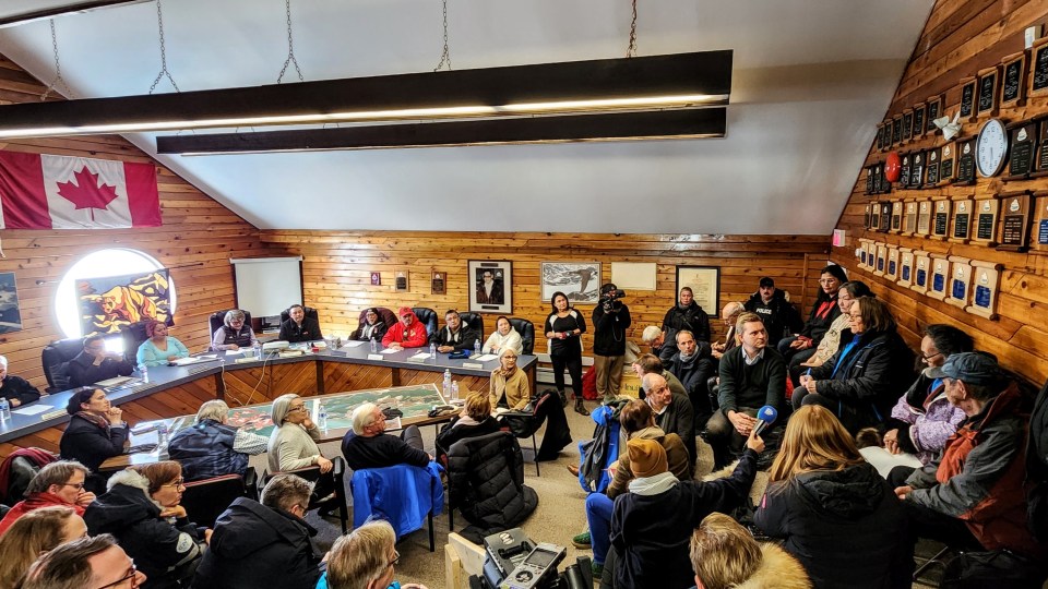 The delegation inside Tuktoyaktuk's hamlet chamber