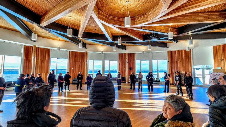 Old Crow residents provide a send-off before the trip back to Fort McPherson