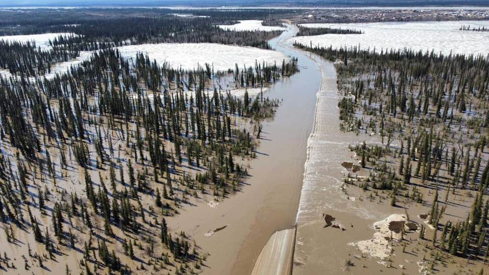 The Peel River flooding out the road into town in Fort McPherson, May 17, 2023. Photo: Dean Charlie