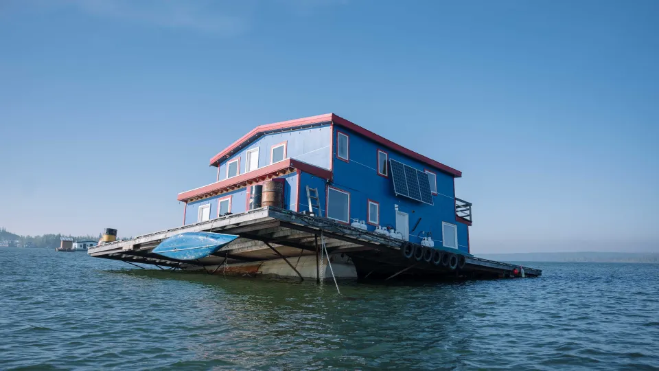 Big Blue lists at a precarious angle on June 2, 2023. Sarah Pruys/Cabin Radio