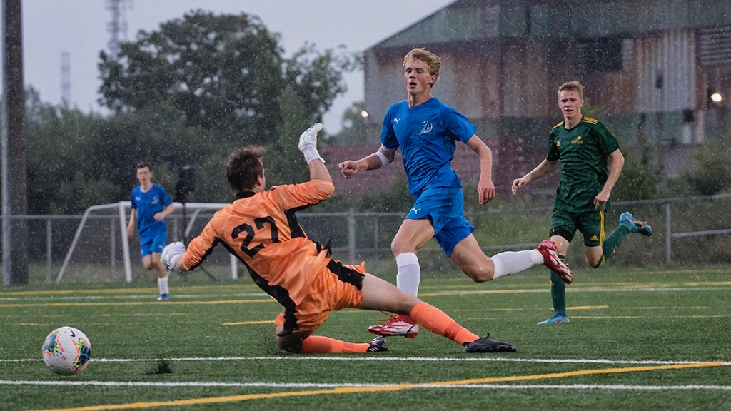 Jack Kotaska scores for the Northwest Territories against Saskatchewan at the 2022 Canada Games