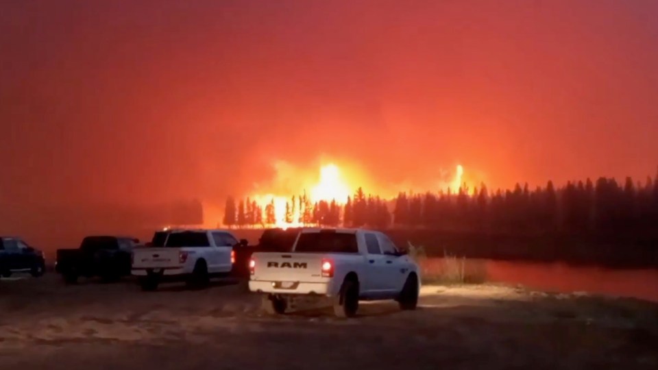 A still from a video posted to Facebook by Seidi Salopree shows the KFN wildfire burning on the night of May 14, 2023