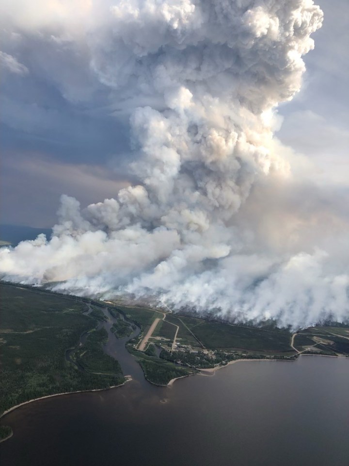 A controlled burn outside Sambaa K'e on June 13, 2023. "This operation removed fuel along the outside of the community – strengthening existing control lines and giving the wildfire less vegetation to work with should it approach the community," the GNWT stated. Photo: GNWT