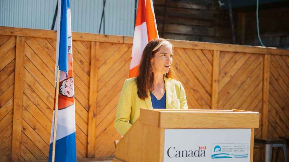 Caroline Wawzonek speaks outside of NWT Brewing Company on June 29, 2023. Photo: GNWT